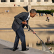 Illustration for article titled Above And Beyond: Obama Spent His Entire Morning Fishing Drowned Tourists Out Of The Lincoln Memorial Reflecting Pool